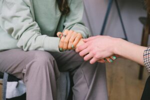 Therapist comforting client